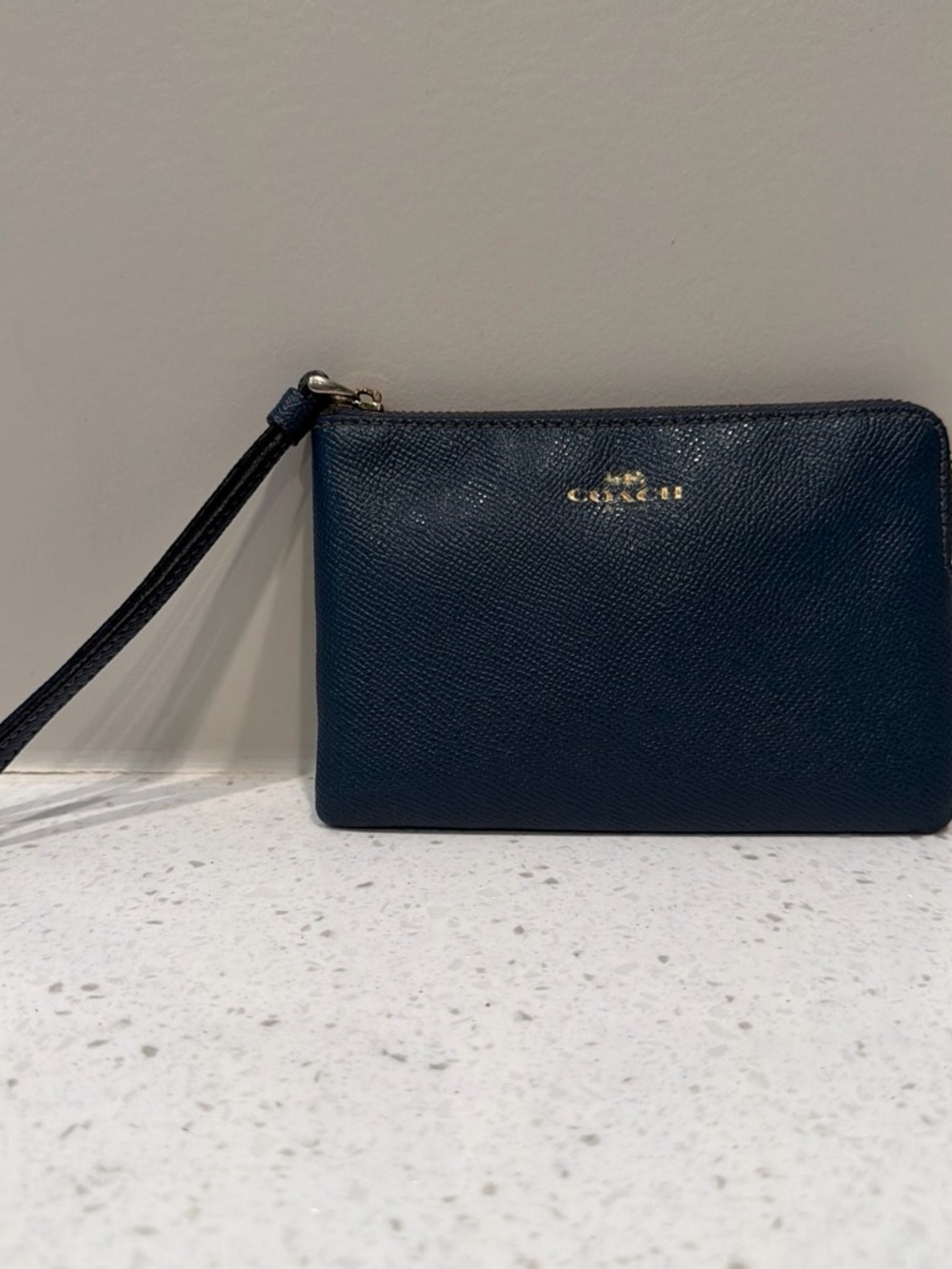 Coach Navy Leather Wristlet with Bronze Hardware